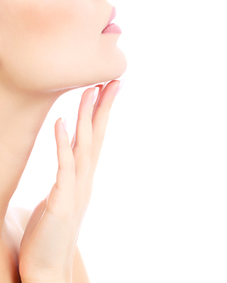 a woman touching her neck